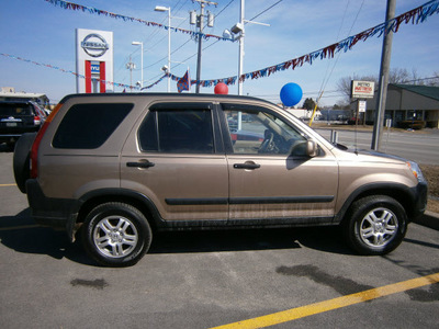 honda cr v 2004 tan suv ex gasoline 4 cylinders all whee drive automatic with overdrive 13502
