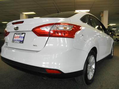 ford focus 2012 white sedan sel gasoline   front wheel drive automatic 34474