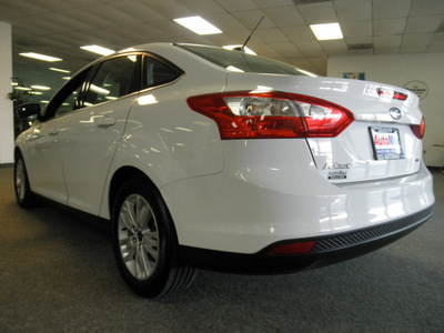 ford focus 2012 white sedan sel gasoline   front wheel drive automatic 34474