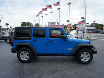 jeep wrangler unlimited 2011 blue suv sport gasoline 6 cylinders 4 wheel drive automatic 33021