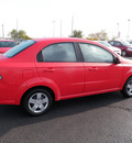 chevrolet aveo 2010 red sedan lt gasoline 4 cylinders front wheel drive automatic 19153