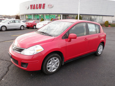 nissan versa 2010 red hatchback gasoline 4 cylinders front wheel drive automatic 19153
