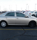 toyota corolla 2010 gold sedan le gasoline 4 cylinders front wheel drive automatic 19153