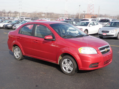 chevrolet aveo 2010 red sedan lt gasoline 4 cylinders front wheel drive automatic 19153