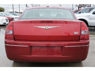 chrysler 300 2010 red sedan touring gasoline 6 cylinders rear wheel drive automatic 77090