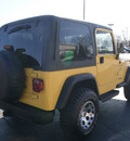 jeep wrangler 2000 yellow suv sport gasoline 6 cylinders 4 wheel drive automatic 61008