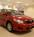 toyota corolla 2010 red sedan le gasoline 4 cylinders front wheel drive automatic 27707