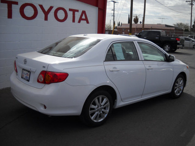 toyota corolla 2010 white sedan gasoline 4 cylinders front wheel drive automatic 79925