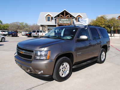 chevrolet tahoe 2011 brown suv lt flex fuel 8 cylinders 4 wheel drive automatic 76087