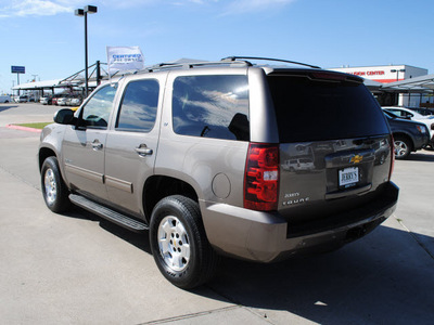 chevrolet tahoe 2011 brown suv lt flex fuel 8 cylinders 4 wheel drive automatic 76087