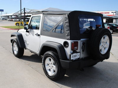 jeep wrangler 2010 silver suv sport gasoline 6 cylinders 4 wheel drive 6 speed manual 76087