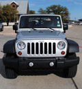 jeep wrangler 2010 silver suv sport gasoline 6 cylinders 4 wheel drive 6 speed manual 76087
