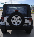 jeep wrangler 2010 silver suv sport gasoline 6 cylinders 4 wheel drive 6 speed manual 76087