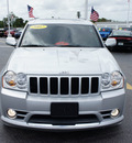 jeep grand cherokee 2007 silver suv srt 8 gasoline 8 cylinders 4 wheel drive automatic 33021