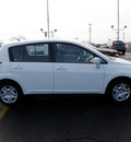 nissan versa 2010 white hatchback gasoline 4 cylinders front wheel drive automatic 19153