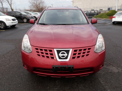 nissan rogue 2009 red suv gasoline 4 cylinders all whee drive automatic 19153