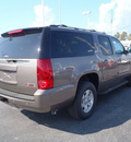gmc yukon xl 2012 brown suv slt 1500 flex fuel 8 cylinders 4 wheel drive automatic with overdrive 28557
