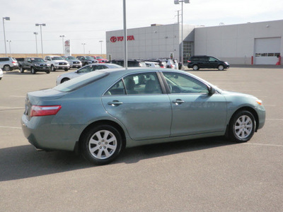 toyota camry 2009 green sedan xle gasoline 6 cylinders front wheel drive automatic 56001