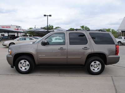 chevrolet tahoe 2011 brown suv lt flex fuel 8 cylinders 4 wheel drive automatic 76087