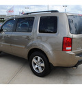 honda pilot 2010 beige suv ex l gasoline 6 cylinders front wheel drive automatic with overdrive 77065