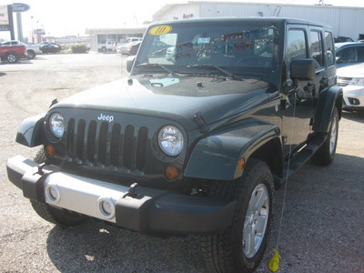 jeep wrangler unlimited 2010 green suv sahara gasoline 6 cylinders 4 wheel drive automatic with overdrive 62863