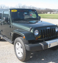 jeep wrangler unlimited 2010 green suv sahara gasoline 6 cylinders 4 wheel drive automatic with overdrive 62863