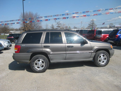 jeep grand cherokee 1999 dk  gray suv laredo gasoline v8 4 wheel drive automatic 62863