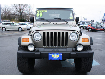 jeep wrangler 2004 light khaki suv unlimited gasoline 6 cylinders 4 wheel drive automatic with overdrive 07701