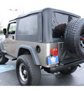 jeep wrangler 2004 light khaki suv unlimited gasoline 6 cylinders 4 wheel drive automatic with overdrive 07701