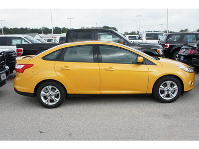 ford focus 2012 orange sedan se flex fuel 4 cylinders front wheel drive automatic 77388