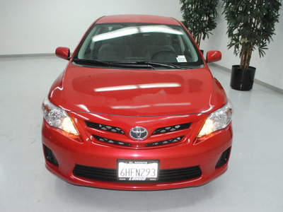 toyota corolla 2011 red sedan le gasoline 4 cylinders front wheel drive automatic 91731