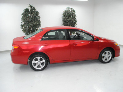 toyota corolla 2011 red sedan le gasoline 4 cylinders front wheel drive automatic 91731