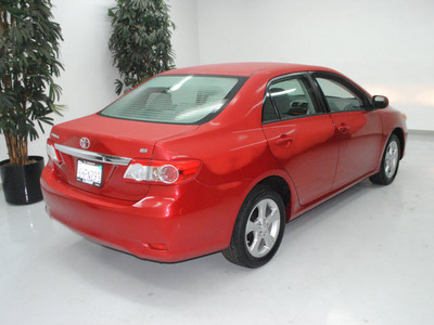 toyota corolla 2011 red sedan le gasoline 4 cylinders front wheel drive automatic 91731