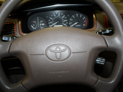 toyota camry 1999 beige sedan le gasoline 4 cylinders front wheel drive automatic 27707