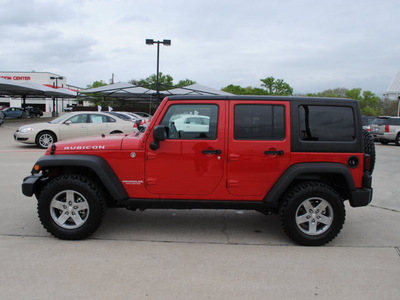 jeep wrangler unlimited 2012 red suv rubicon gasoline 6 cylinders 4 wheel drive automatic 76087