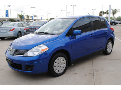 nissan versa 2009 blue hatchback 1 8 s gasoline 4 cylinders front wheel drive automatic with overdrive 77065