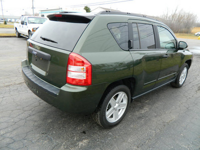 jeep compass 2009 green suv sport gasoline 4 cylinders 4 wheel drive automatic 14224