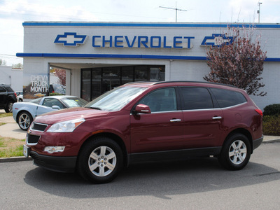 chevrolet traverse 2010 red suv lt gasoline 6 cylinders all whee drive automatic 27591