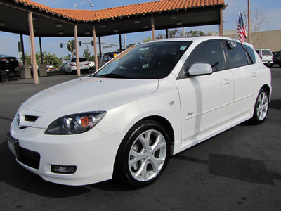mazda mazda3 2009 crystal white hatchback s touring gasoline 4 cylinders front wheel drive automatic 92653