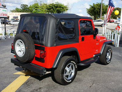 jeep wrangler 2006 red suv x gasoline 6 cylinders 4 wheel drive 6 speed manual 33021