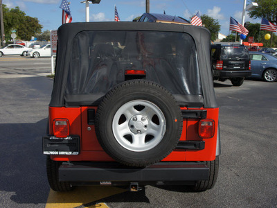 jeep wrangler 2006 red suv x gasoline 6 cylinders 4 wheel drive 6 speed manual 33021