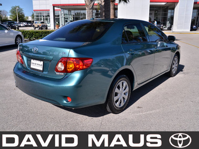 toyota corolla 2009 green sedan le gasoline 4 cylinders front wheel drive automatic 32771