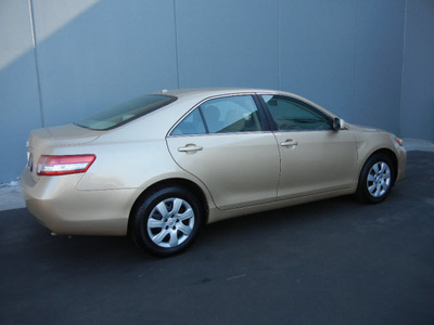 toyota camry 2011 tan sedan le gasoline 4 cylinders front wheel drive automatic 55448