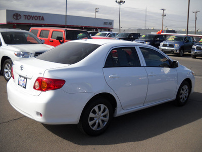 toyota corolla 2010 white sedan gasoline 4 cylinders front wheel drive automatic 79925