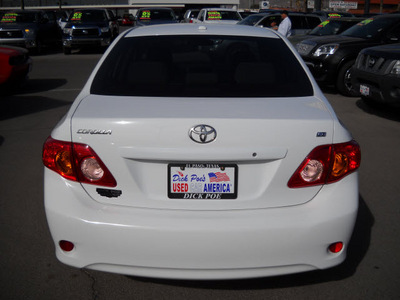 toyota corolla 2010 white sedan gasoline 4 cylinders front wheel drive automatic 79925