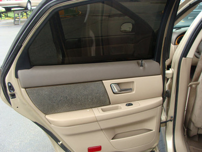 ford taurus 2000 gold sedan lx flex fuel v6 front wheel drive automatic 60411