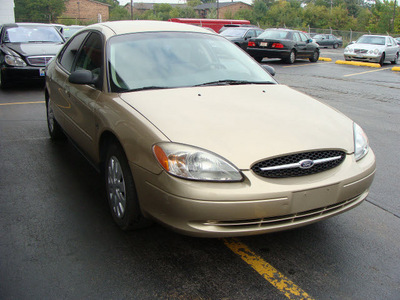 ford taurus 2000 gold sedan lx flex fuel v6 front wheel drive automatic 60411