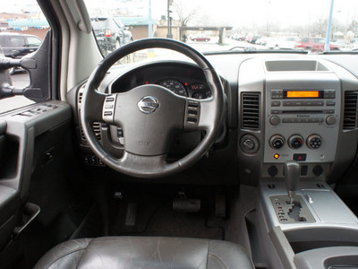 nissan titan 2005 black le gasoline 8 cylinders 4 wheel drive automatic 60411