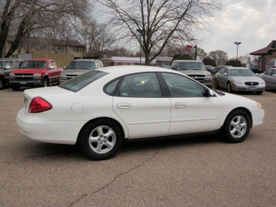 ford taurus 2003 white sedan ses flex fuel 6 cylinders front wheel drive automatic with overdrive 55318
