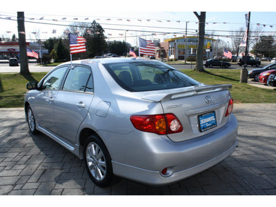 toyota corolla 2009 classic silver sedan s gasoline 4 cylinders front wheel drive automatic 07702